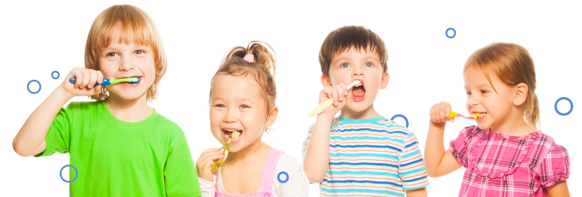 four kids brushing their teeth